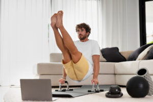 Man exercising at home with bodyweight training – full body workout at home without equipment